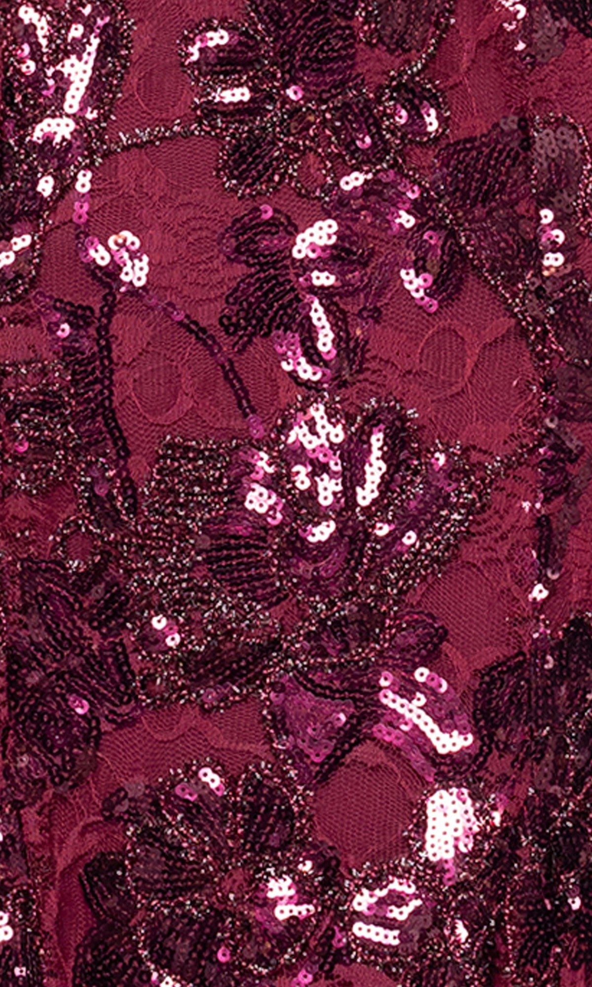 Close-up of the Blondie Nites 5883BN long prom dress fabric, featuring floral lace adorned with shiny magenta and dark pink sequins.